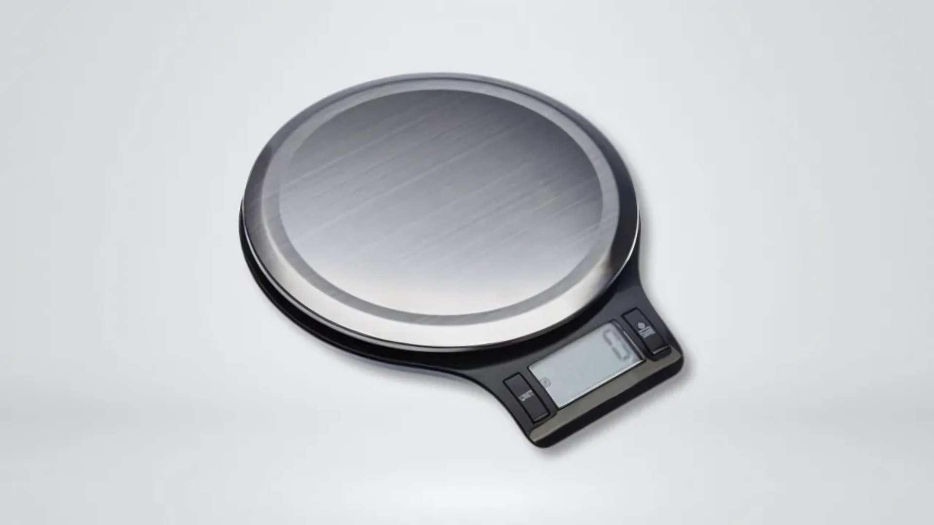 Black and silver Digital kitchen scale on a solid gray background