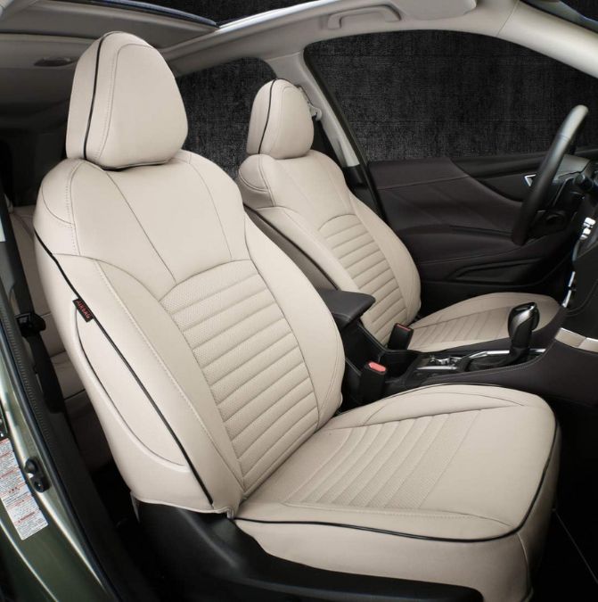 A Subaru Forester interior featuring EKR Custom Fit Forester Car Seat Covers in a sleek beige design.