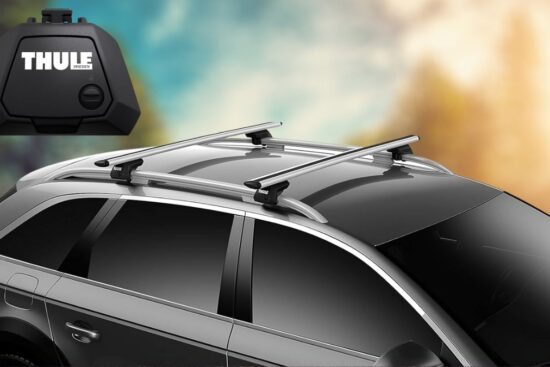 A car equipped with the Thule Evo Raised Rail Foot and roof rack system, showing its secure and stylish design for carrying extra gear with ease.