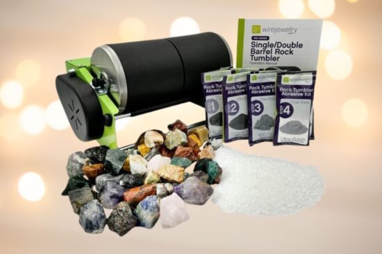 A rock tumbler kit with rough gemstones and polishing abrasives for tumbling stones.