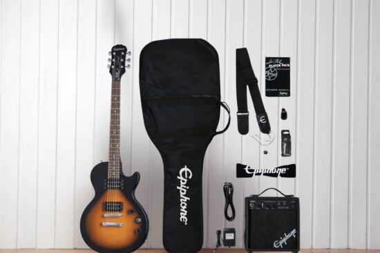 The Epiphone Les Paul Player Pack displayed with a guitar, amp, gig bag, strap, and accessories, offering a complete setup for beginner guitarists.