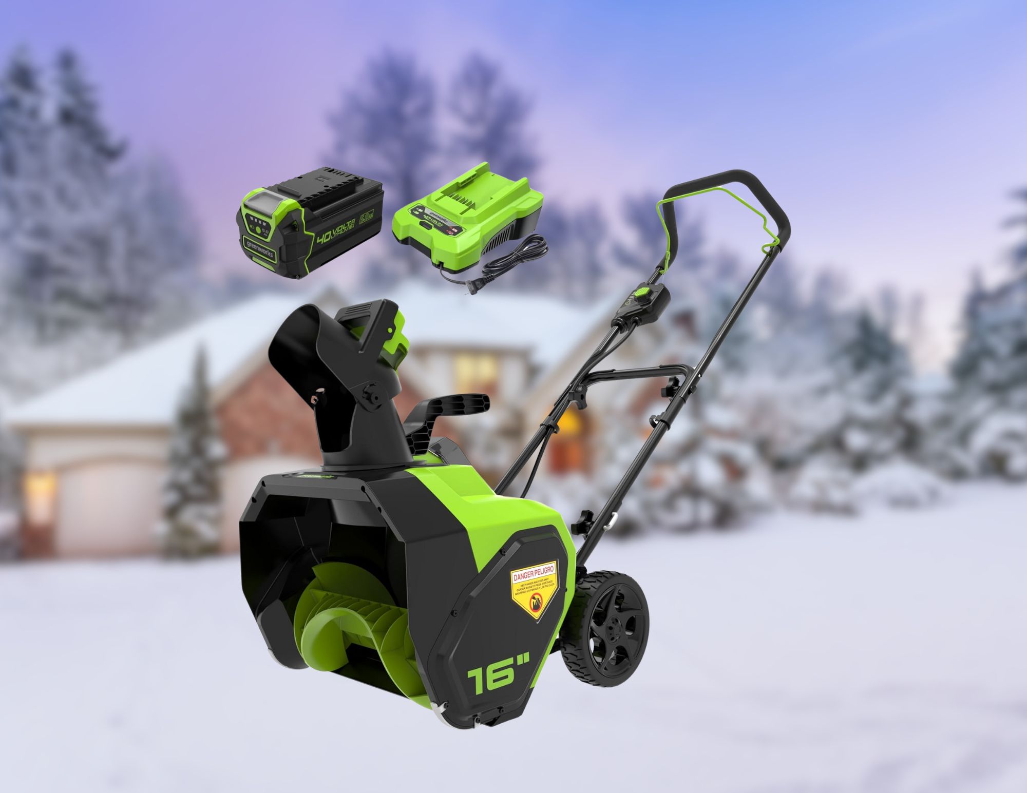 A Greenworks 40V 16-Inch Cordless Snow Blower is displayed with its battery and charger, set against a snowy background featuring a cozy home and snow-covered trees.