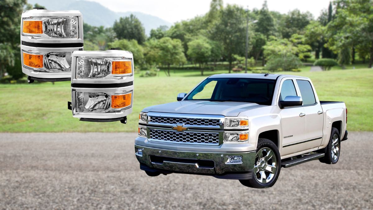 A white Chevy Silverado 1500 is parked outdoors with a set of replacement headlights displayed beside it.