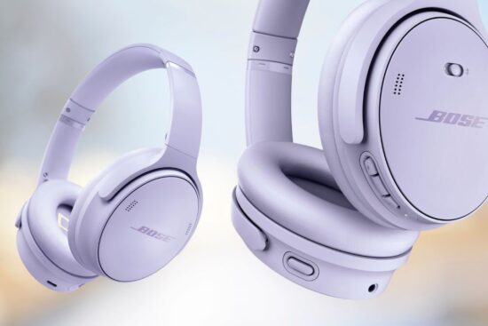 A pair of sleek over-ear wireless headphones in a soft lavender shade with comfortable ear cushions for an immersive listening experience.