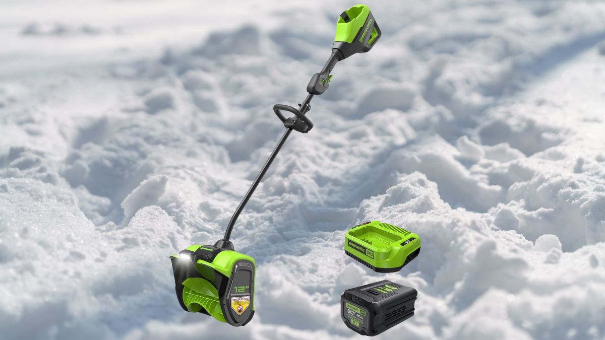 A battery-powered cordless snow shovel with a brushless motor, LED light, and ergonomic handle, designed for quick and efficient snow removal.