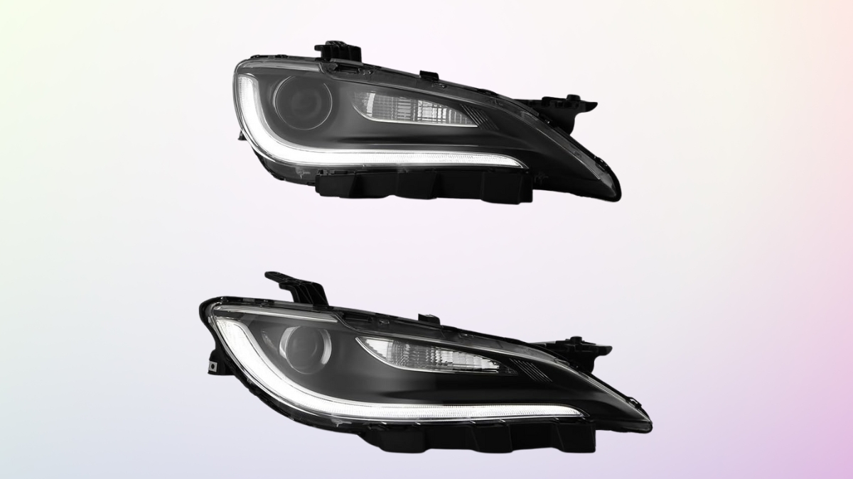 A pair of black LED car headlights with a sleek design and bright daytime running lights.