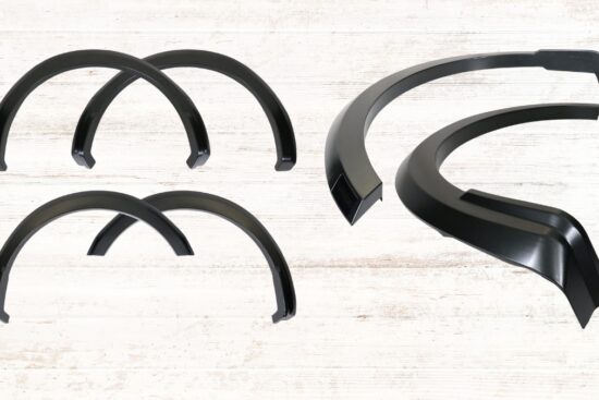 A set of black fender flares for the 2021-2024 Ford F-150, designed for a rugged look and extra protection against mud and debris.