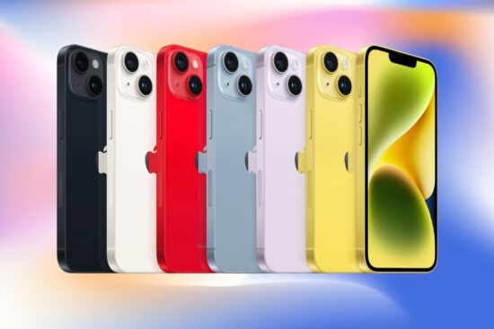 A row of iPhones in different colors, including black, white, red, blue, purple, and yellow, is displayed against a colorful blurred background.