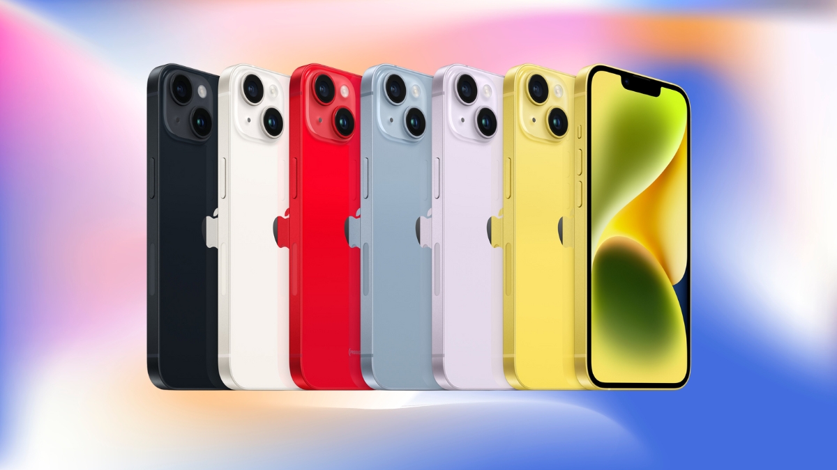 A row of iPhones in different colors, including black, white, red, blue, purple, and yellow, is displayed against a colorful blurred background.
