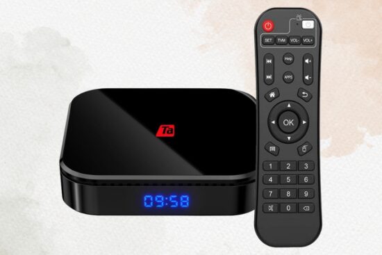 The Tanggula X1PRO 2025 TV Box shown with its remote control and digital clock display.