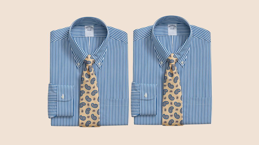 Two blue striped dress shirts folded with paisley ties.