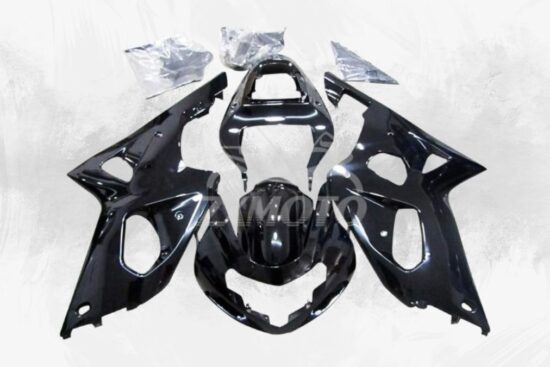 Glossy black ZXMOTO Suzuki GSXR 1000 Fairings Kit laid out, showing pre-drilled ABS plastic body panels for easy installation.