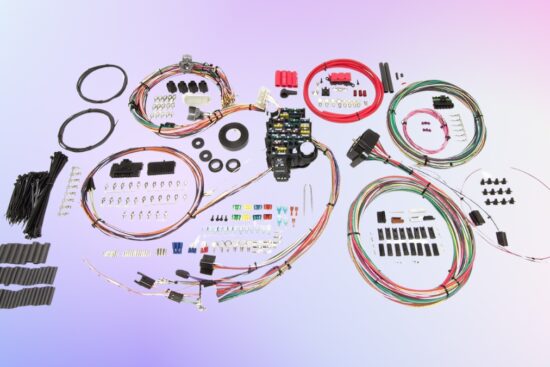 A complete automotive wiring harness kit with cables, connectors, fuses, and accessories on a gradient background.