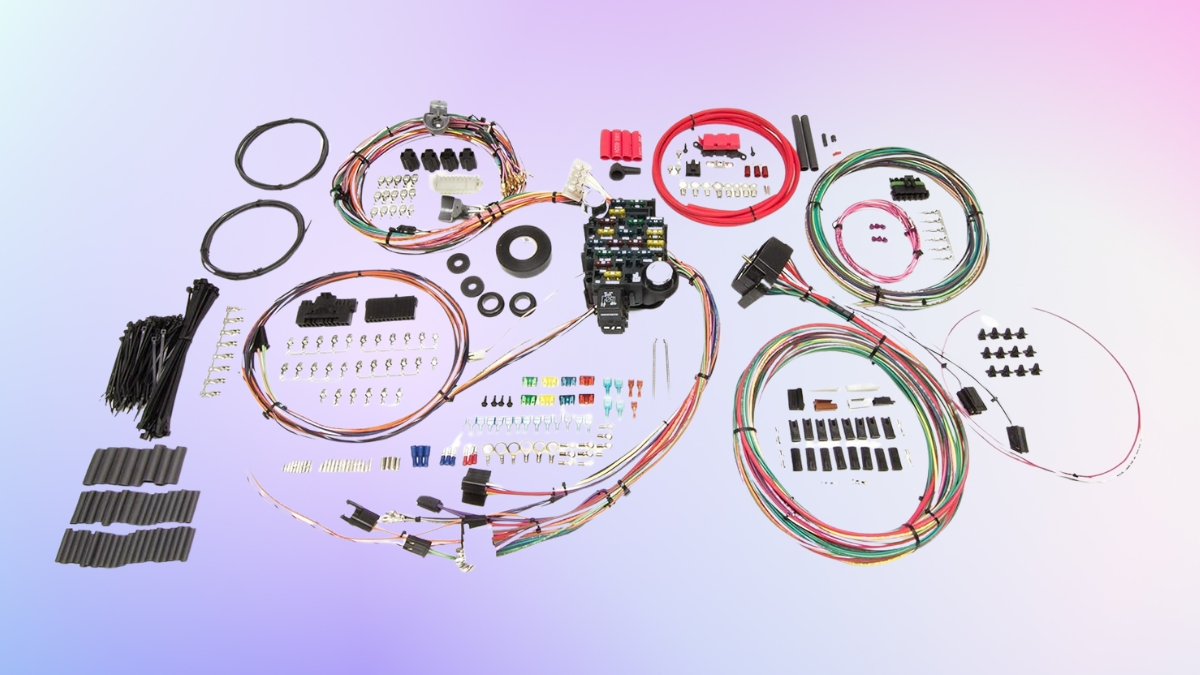 A complete automotive wiring harness kit with cables, connectors, fuses, and accessories on a gradient background.