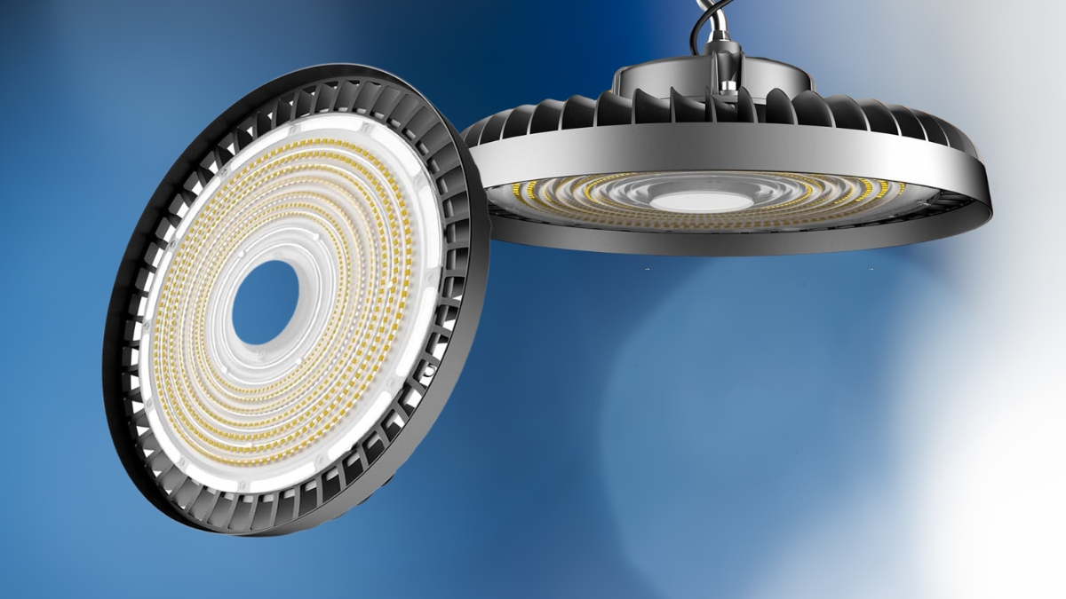 A round LED high bay light with a silver heat sink, showing its detailed inner structure and hanging from a hook.