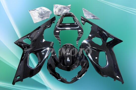 Glossy black ZXMOTO fairing kit parts for Suzuki GSXR 1000 2000–2002 displayed on a light green background.