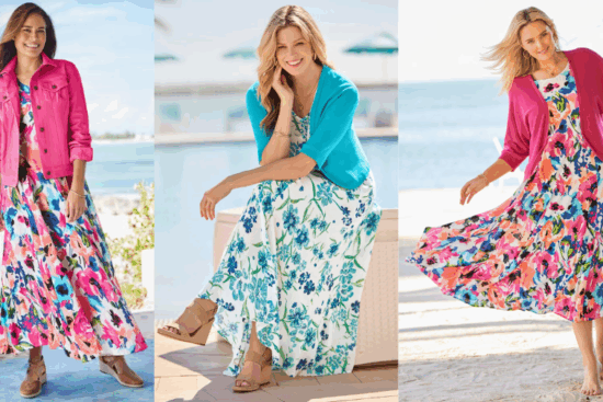 Three women wearing vibrant floral maxi dresses with cardigans, posing outdoors by the ocean.