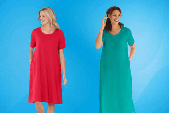 Two women smiling and wearing solid red and green short-sleeve dresses against a bright blue background.