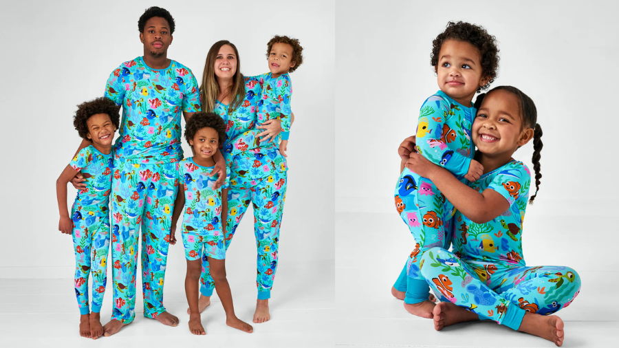 A family of five, including two adults and three children, all wearing bright blue matching pajamas with colorful sea creature prints, posing and smiling together.