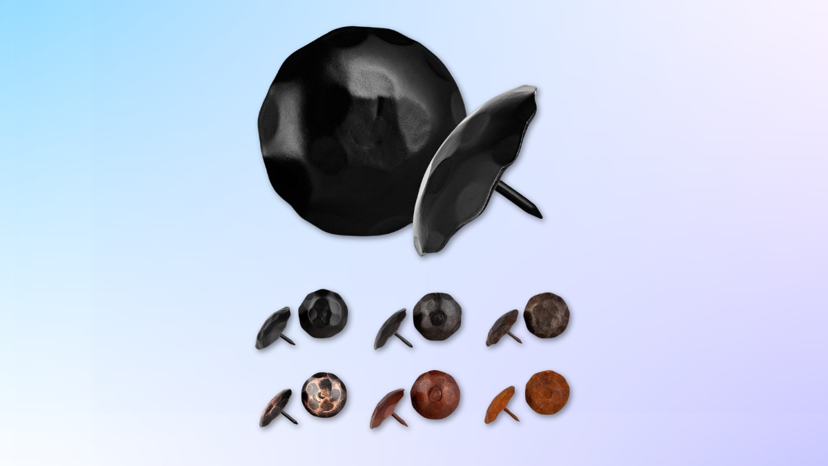 A set of Borderland Rustic decorative clavos nails in different finishes and sizes, including black, bronze, and rust tones, used for barn doors, wood beams, and gates.