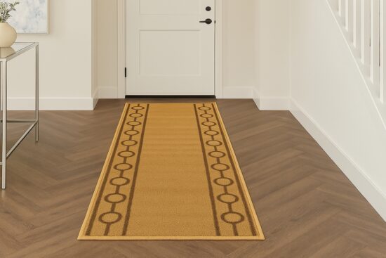 Tan RugStylesOnline custom length runner rug with circle pattern placed in a modern entryway with herringbone wood flooring.