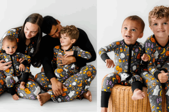 A family of four dressed in matching Halloween-themed pajamas with pumpkins, ghosts, and candy designs.