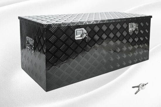Black aluminum truck toolbox with diamond tread design, shown with two locking latches and a pair of keys on a white background.