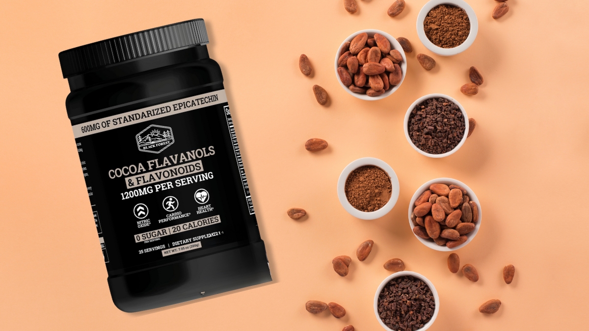 Black Forest high flavanol cocoa powder jar with cocoa beans and powder in small bowls on a light background.