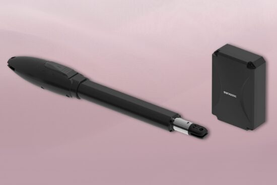 Black automatic gate opener with swing arm and control box shown on a soft pink background.