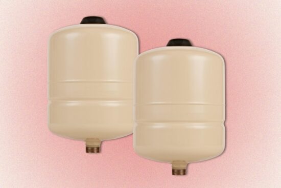 Two beige Red Lion inline pressure tanks with 3/4 inch MNPT fittings shown on a soft pink background.