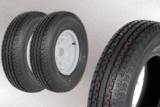 Durun ST205/75R15 trailer tire set with white trailer rims and all-season tread pattern shown up close.
