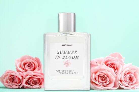 Just Juice Summer in Bloom fragrance inspired by The Summer I Turned Pretty shown with soft pink roses.
