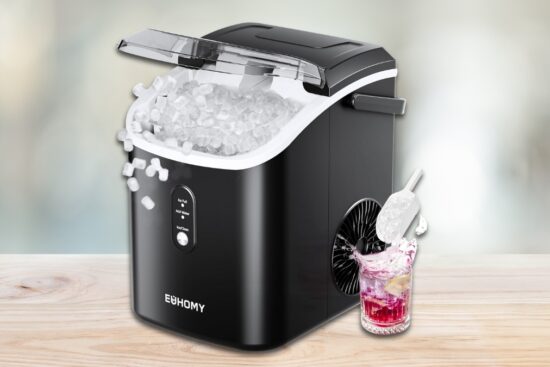 EUHOMY Nugget Ice Maker on a countertop producing soft nugget ice with a scoop and chilled drink beside the machine.