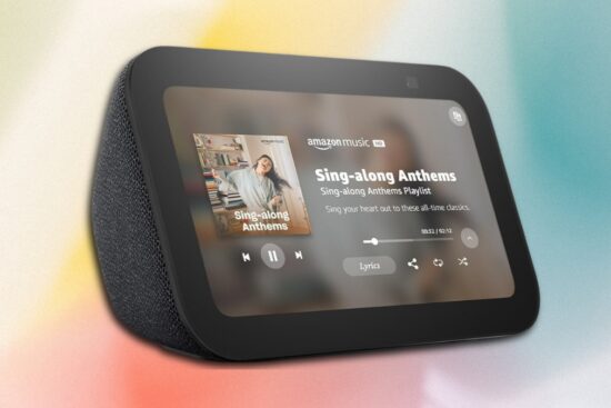 Amazon Echo Show 5 smart display playing music on a compact touchscreen with built-in speaker.